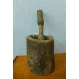 A carved hardwood pestle and mortar, possibly Native American, 56cm