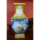 A Chinese famille jaune porcelain vase