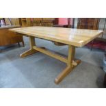 An Arts and Crafts Cotswold School walnut refectory table, 73cms h, 190cms l, 91cms w