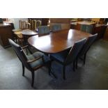 A McIntosh Ambassador range mahogany extending dining table and six dining chairs