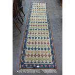 A Gabbeh geometric patterned wool runner rug