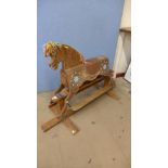 A painted pine child's rocking horse