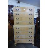 A George III style bleached walnut chest on chest