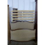 A French beech and upholstered double bed