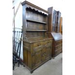 A carved Ipswich oak dresser