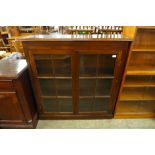 A mahogany two door bookcase