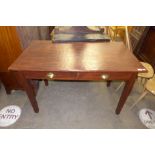 A stained pine two drawer desk and a mahogany two drawer side table