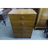 A teak chest of drawers