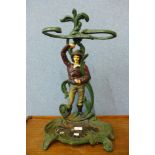 A painted cast iron figural stick stand