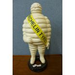 A cast iron Michelin Man advertising figure