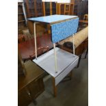 Two Formica topped kitchen tables