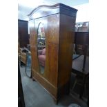 An Edward VII inlaid mahogany wardrobe