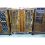 A walnut display cabinet