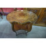 A French Louis XV style walnut and marquetry inlaid etagere