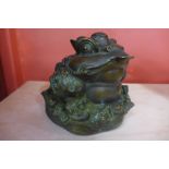 An oriental bronze figure of a grotesque frog