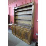 A Victorian Aesthetic Movement oak library bookcase