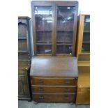 An oak bureau bookcase