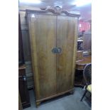 A walnut fitted wardrobe