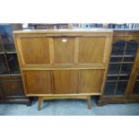 A teak record cabinet