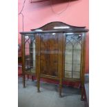 An Edward VII inlaid mahogany fitted breakfront display cabinet