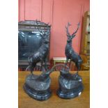 A pair of French style bronze stags, on black marble plinths, 73cms h