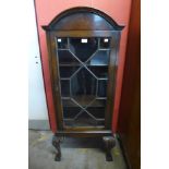 A George I style mahogany cabinet on stand