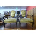 A pair of Edward VII inlaid mahogany and upholstered open armchairs