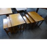 Two teak nests of tables