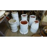 Six painted chimney pots