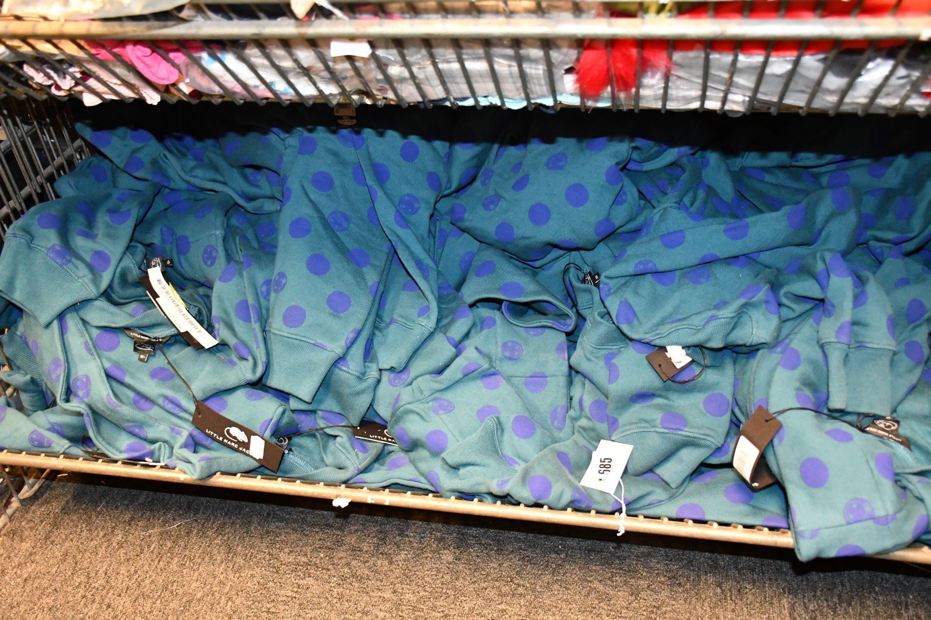A quantity of girl's as new green/blue spotted Little Marc Jacobs sweatshirt dresses, various ages.