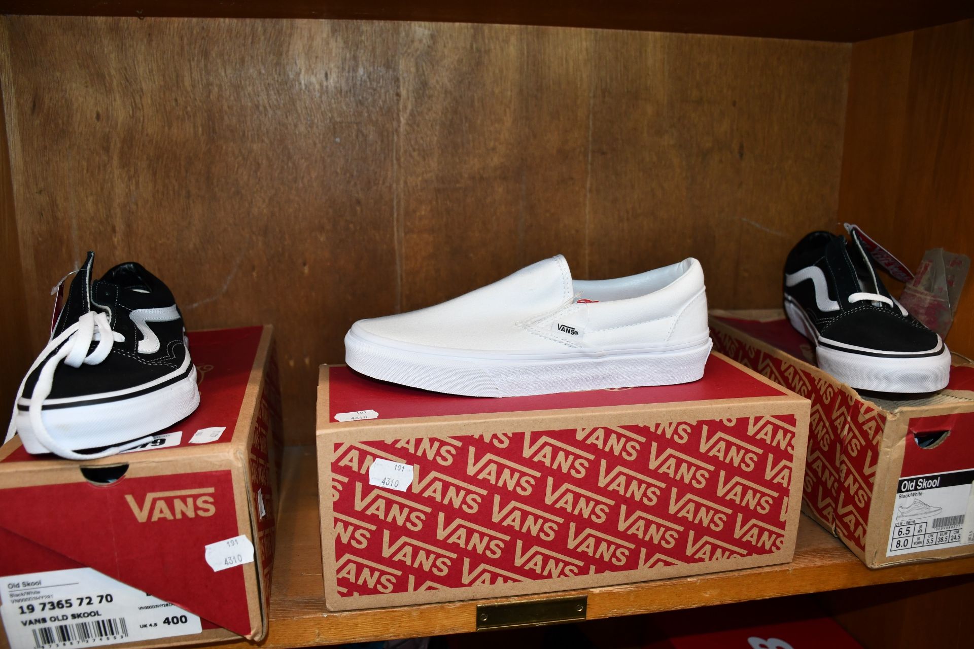 Two pairs of Vans Old Skool shoes (UK 4.5 and 5.5) together with a pair of Vans Classic slip-on's (