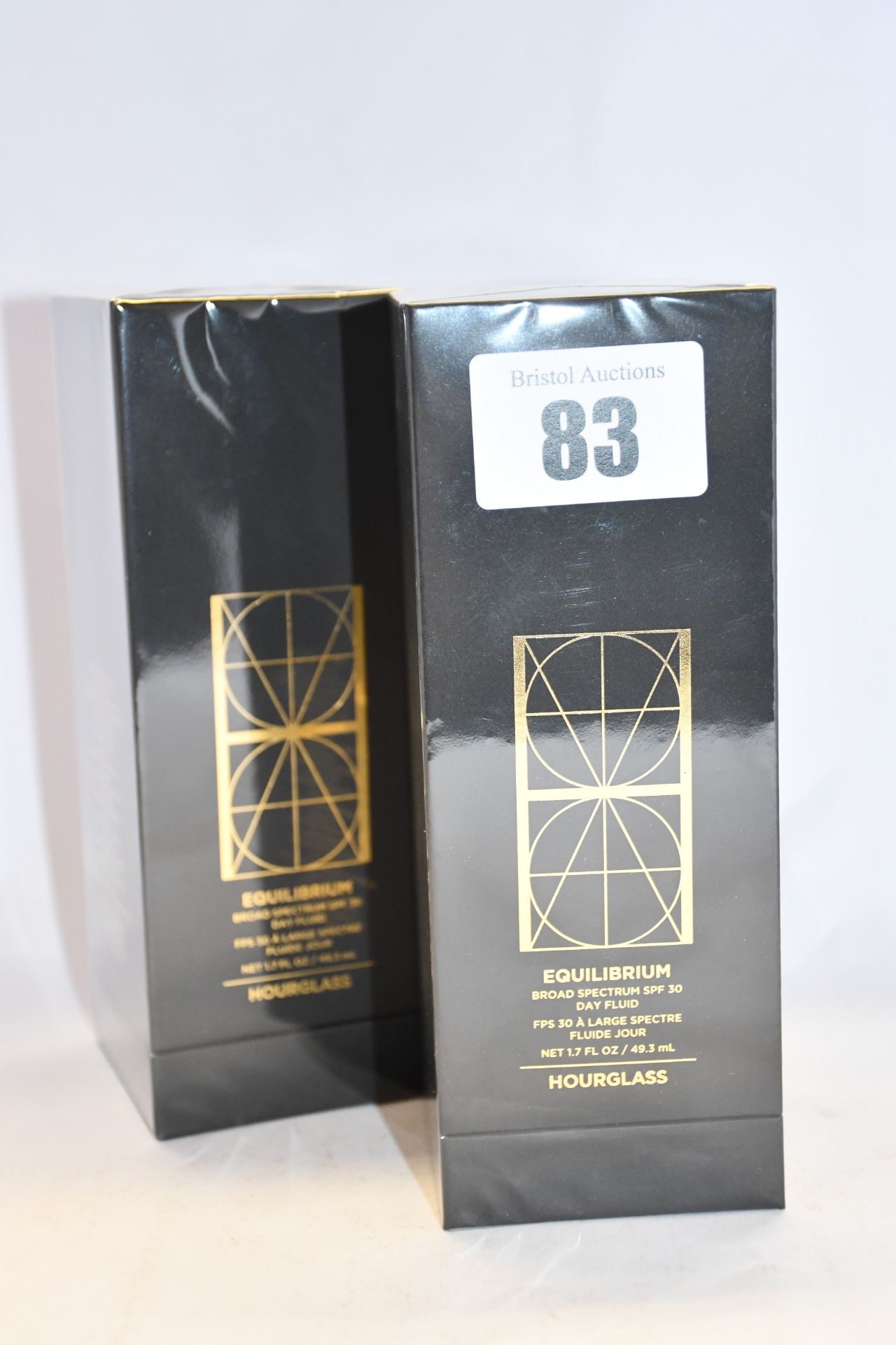 Two boxed as new Hourglass Equilibrium broad spectrum SPF 30 day fluid (49.3ml).