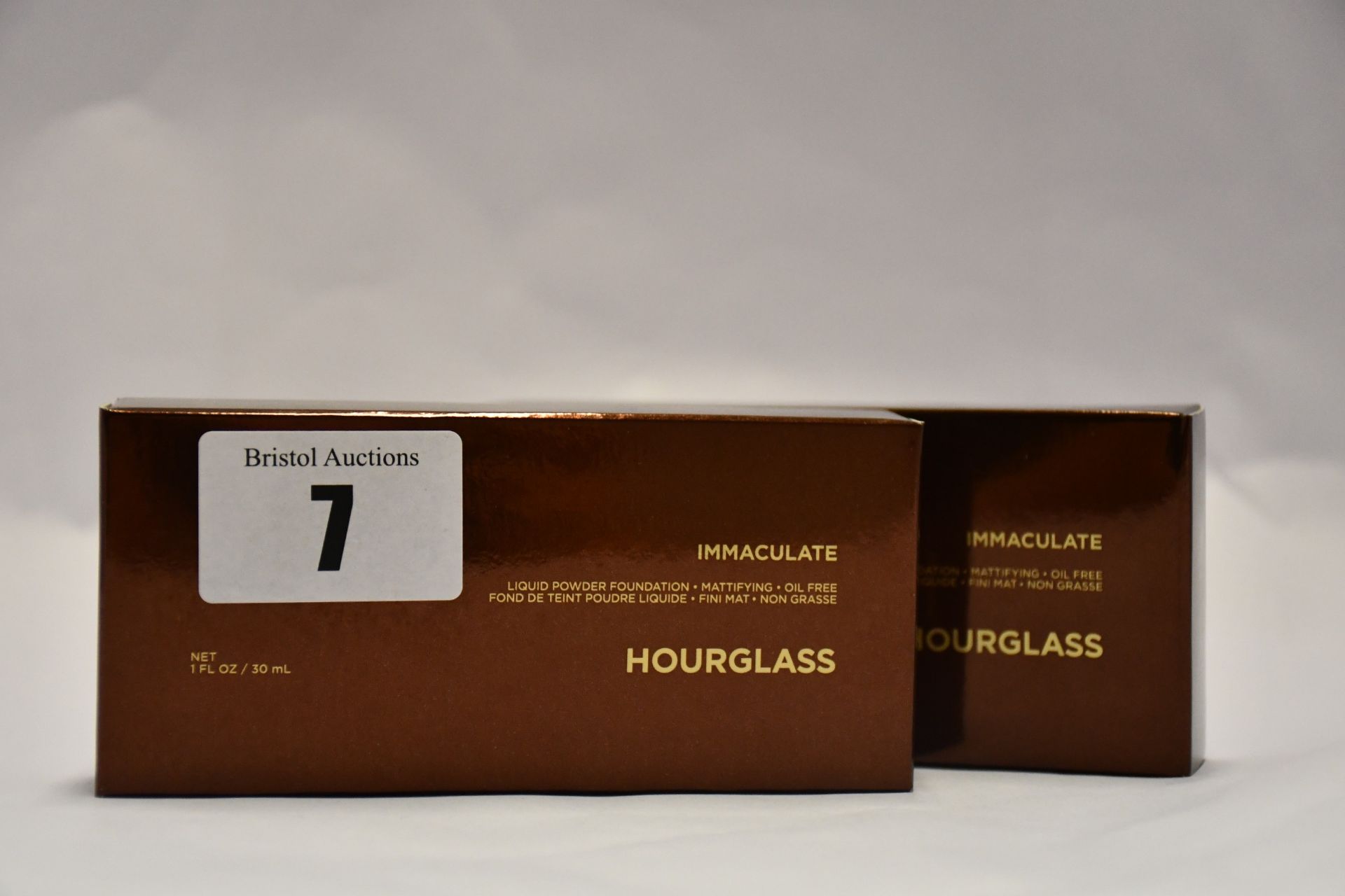 Ten boxed as new Hourglass Immaculate Liquid Powder Foundation (30ml), in various shades.
