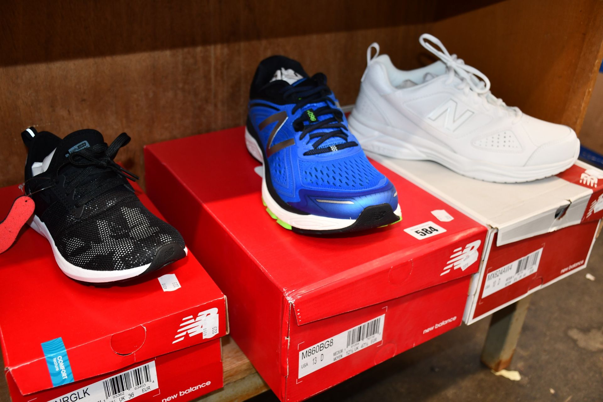 Three pairs of as new New Balance trainers; WXNRGLK (UK 3.5), M860BG8 (UK 12.5) and MX624AW4 (UK 9.