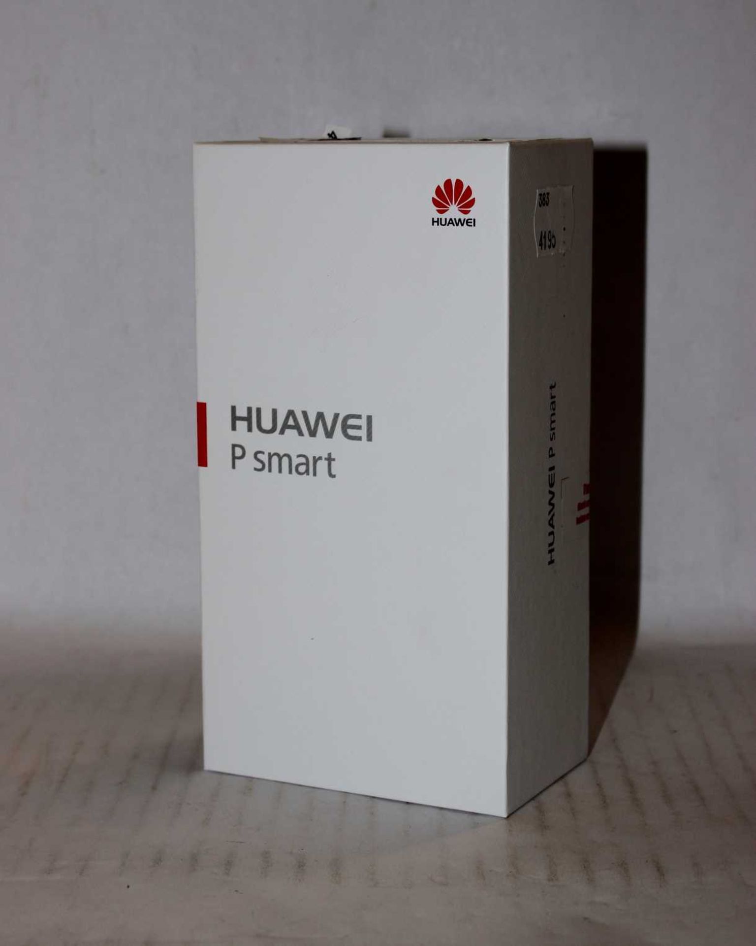 A boxed as new Huawei P Smart FIG-LX1 32GB in Black (IMEI: 862239045132785) (Box sealed).