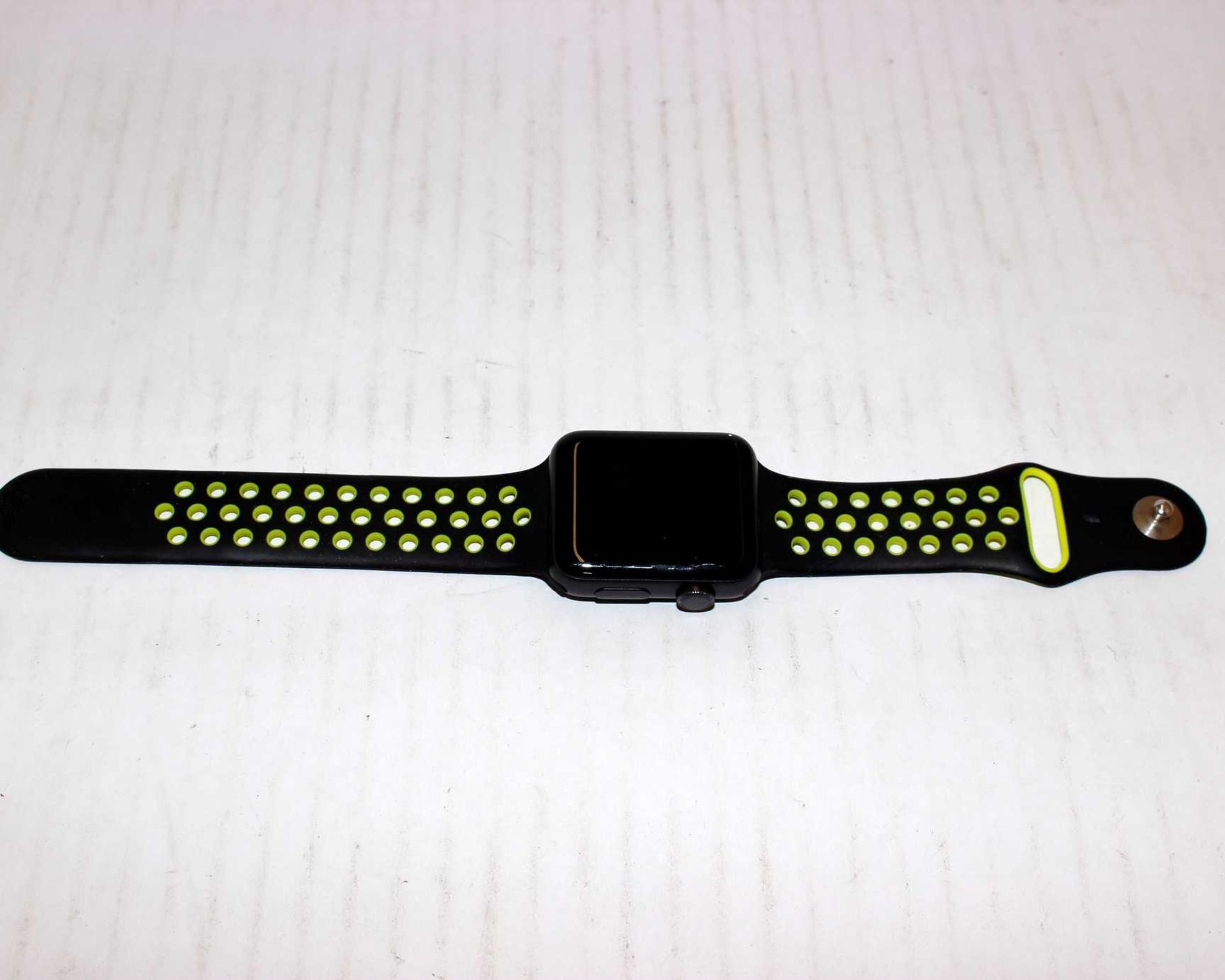 A pre-owned Apple Watch Series 3 (Aluminum, GPS, 42 mm) in Space Grey with Black/Yellow Sports