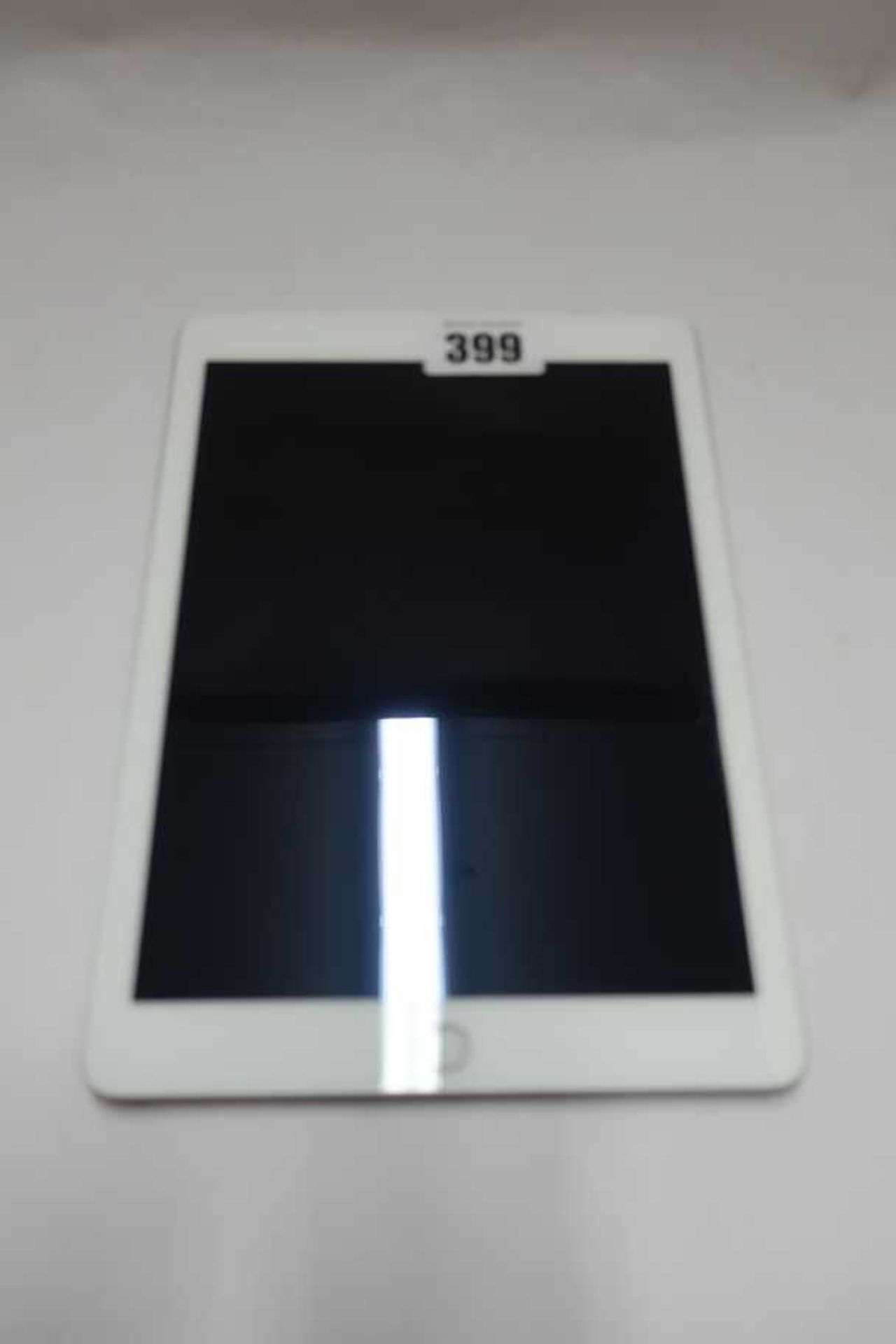 A pre-owned Apple iPad 9.7" 5th Gen (Wi-Fi Only) A1822 32GB in Silver (Serial: GCGV93L8HLFC) (
