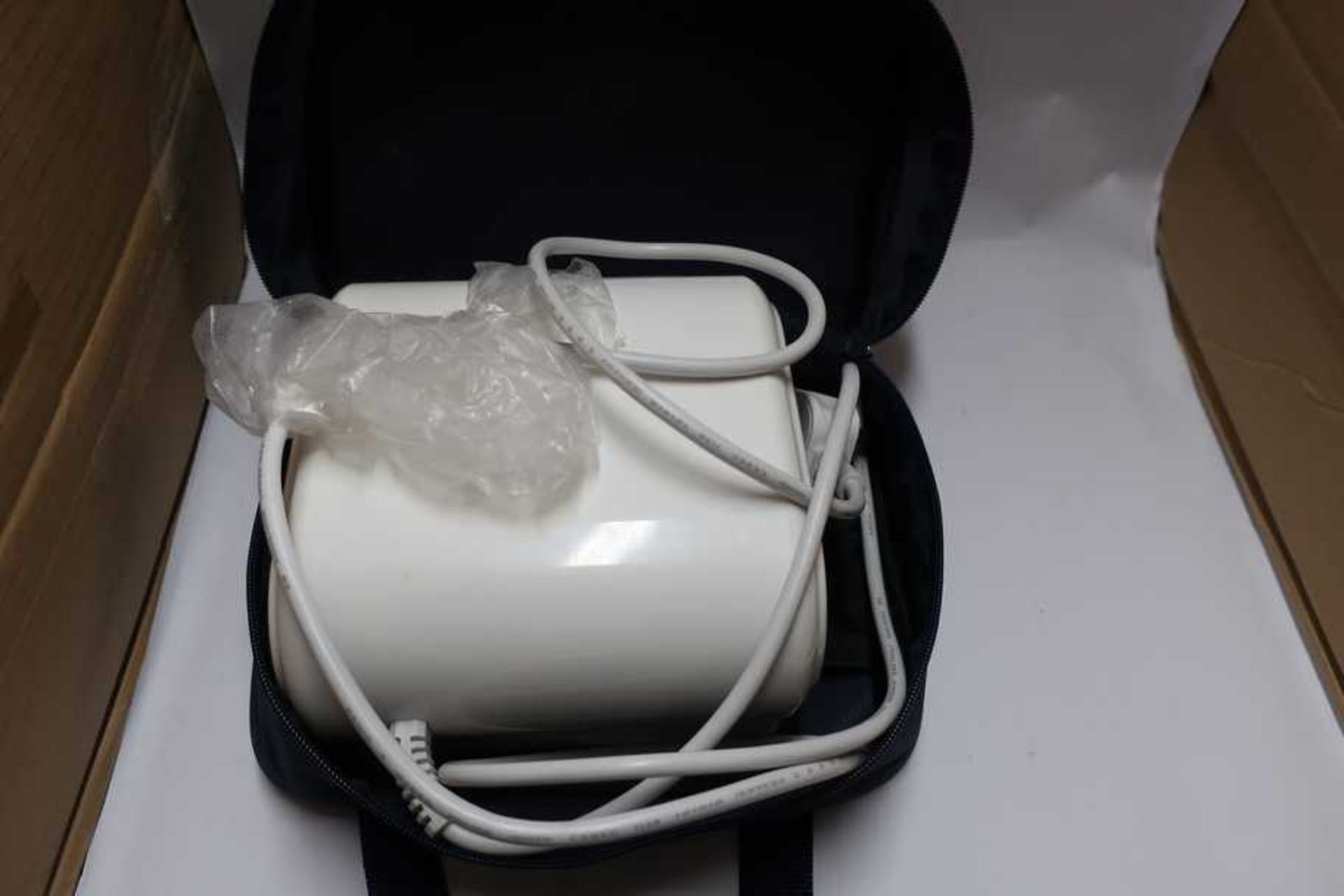 A pre-owned Omron C28P Compressor Nebuliser in storage bag.