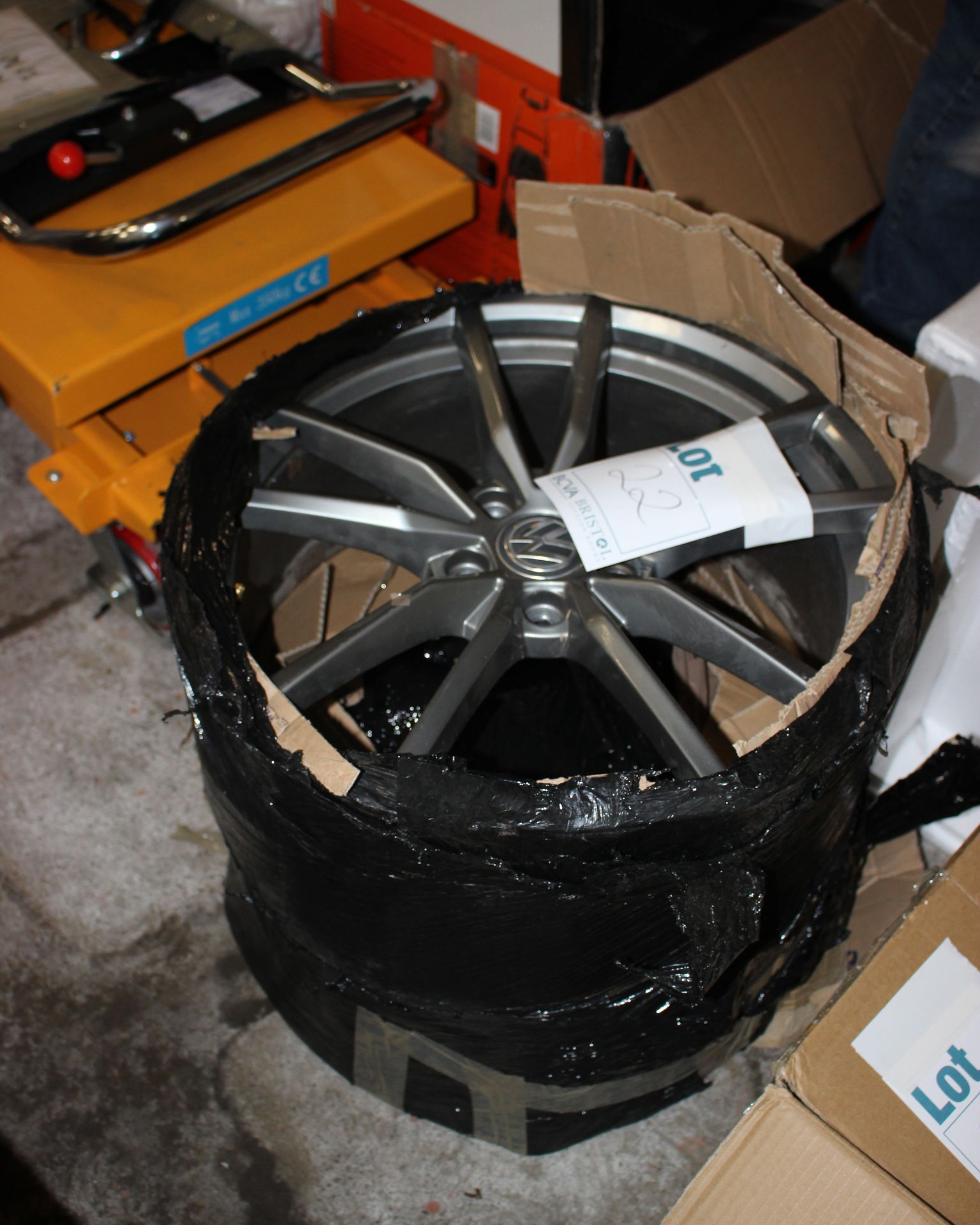 Two Volkswagen alloy wheels, no sizes.