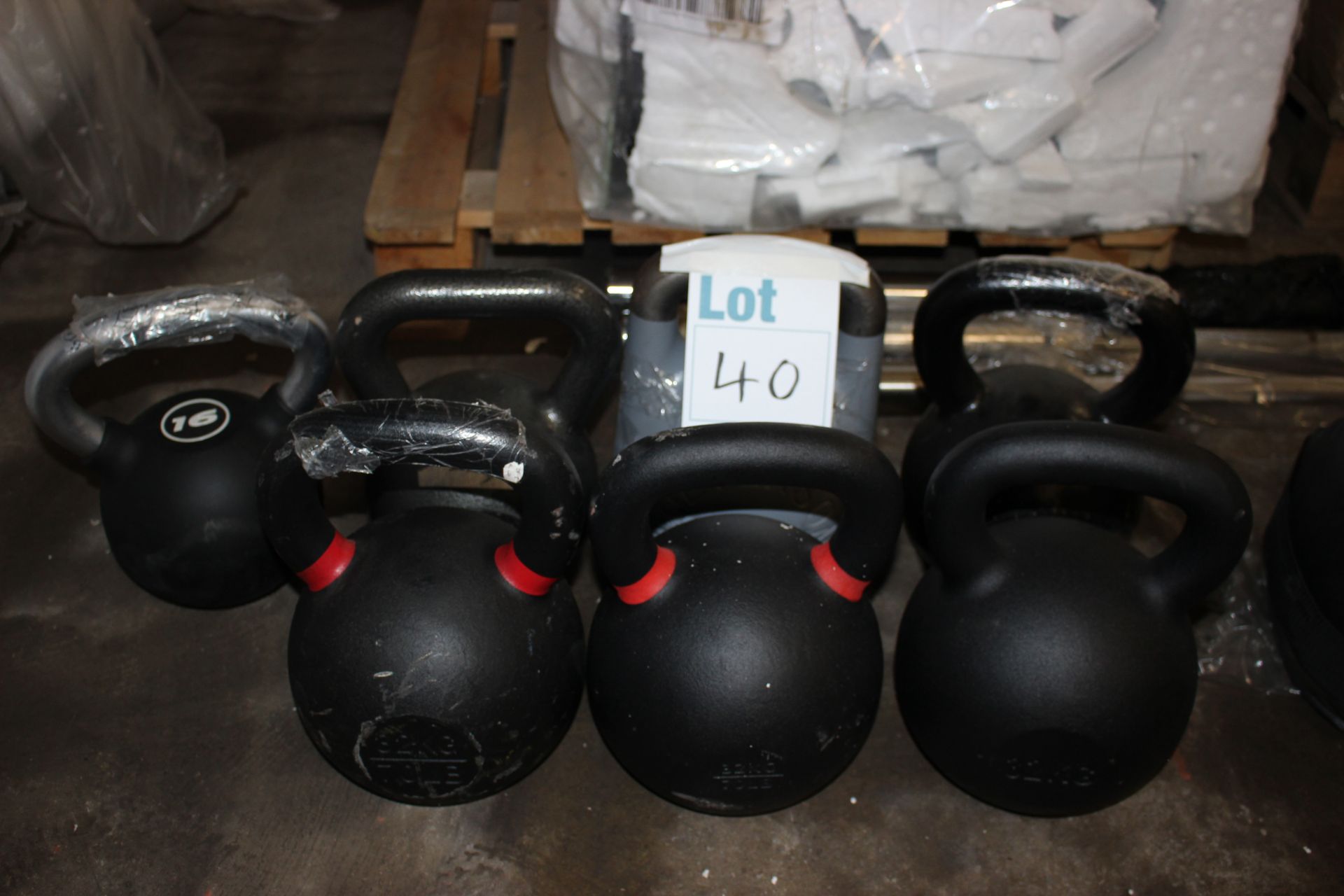 Seven kettle bells varying from 16kg to 32kg.