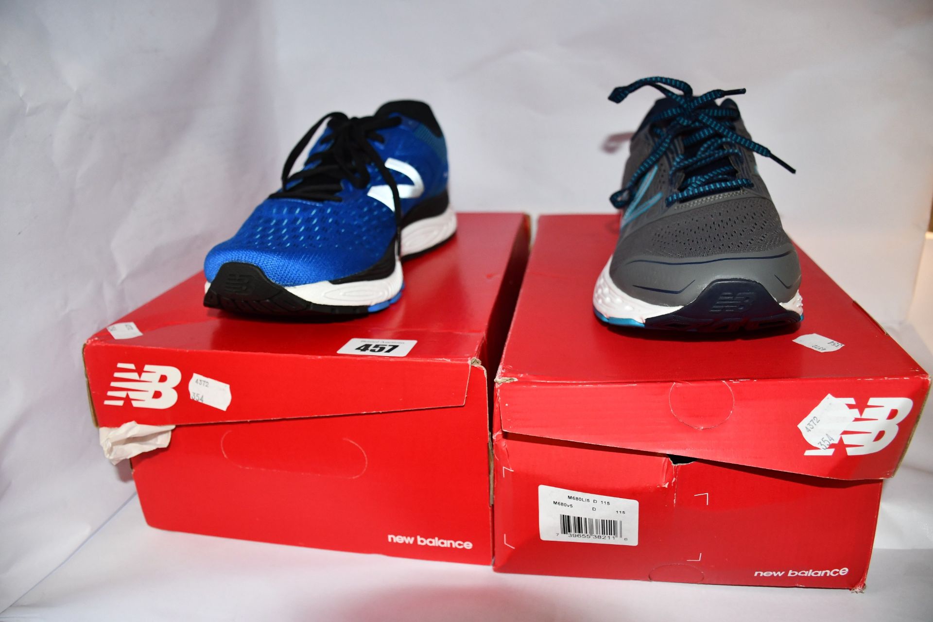 Two pairs of as new New Balance trainers; MSOLVLC2 (UK 11) and M680LI5 (UK 11).