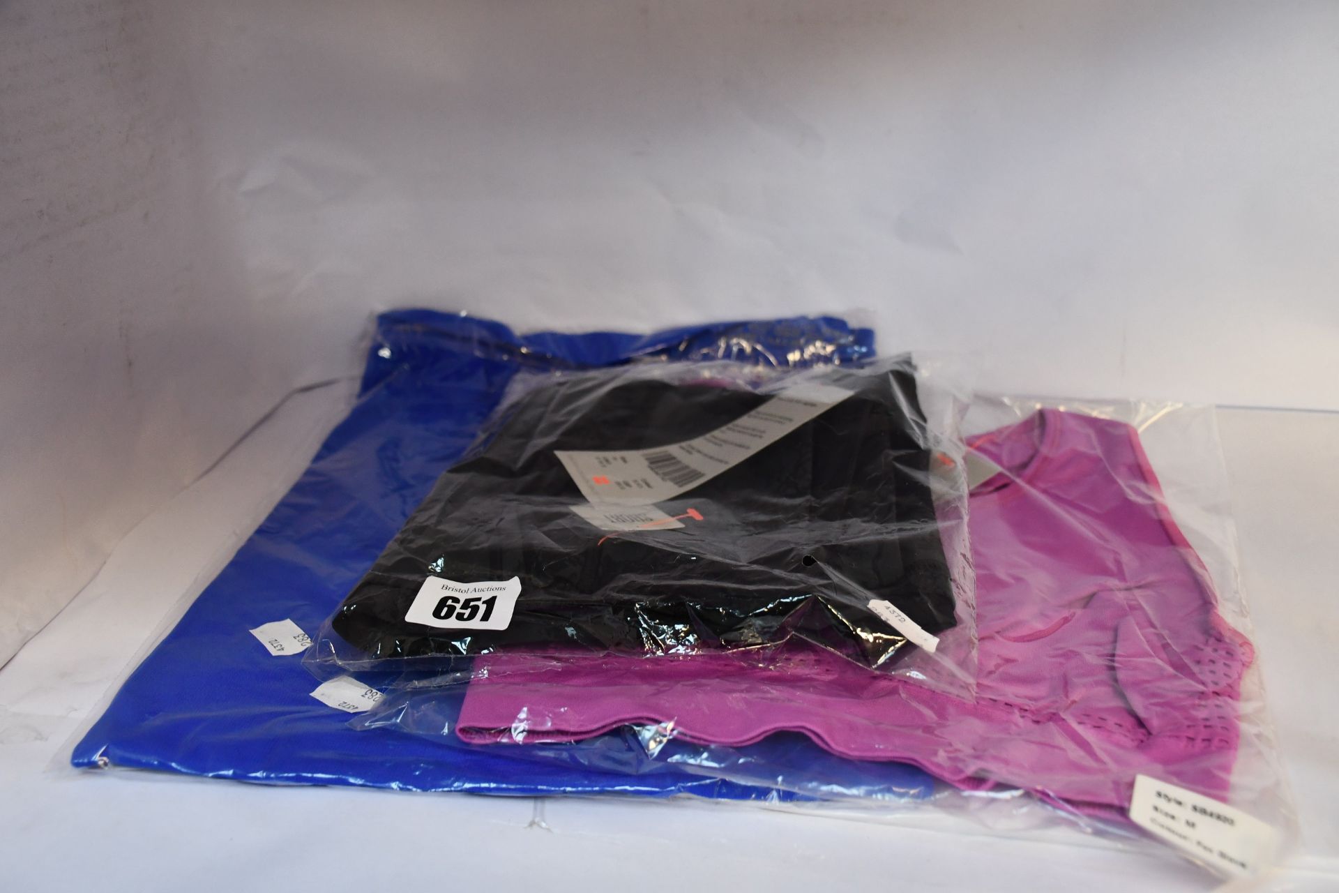 Three items of as new Sweaty Betty sportswear; an Athlete seamless vests (L - RRP £35 ), Stamina