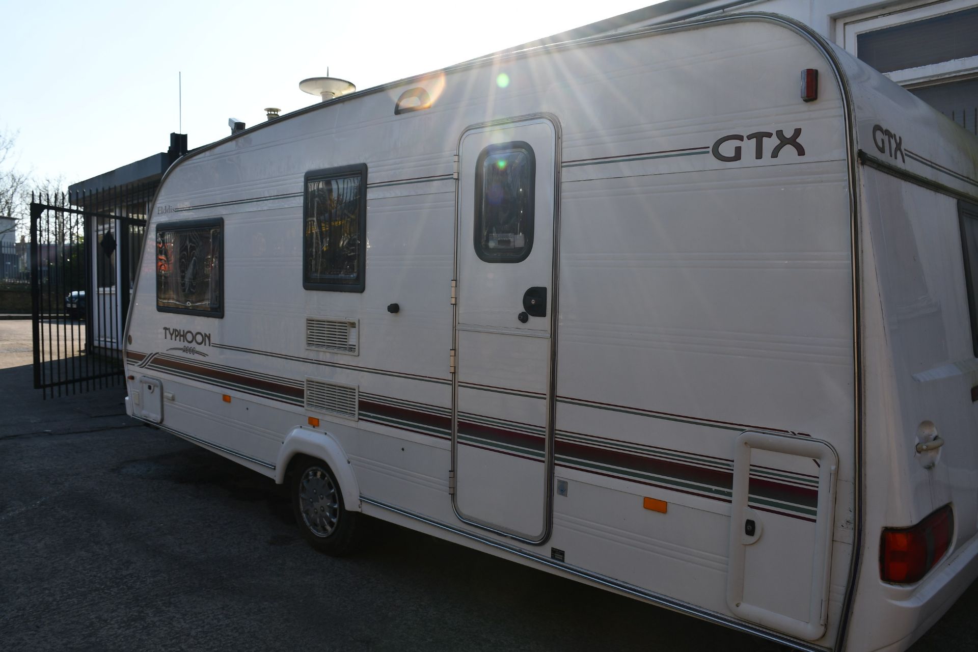 An Elddis GTX 2000 Typhoon three berth single axle caravan with end washroom, side dinette, - Image 4 of 14