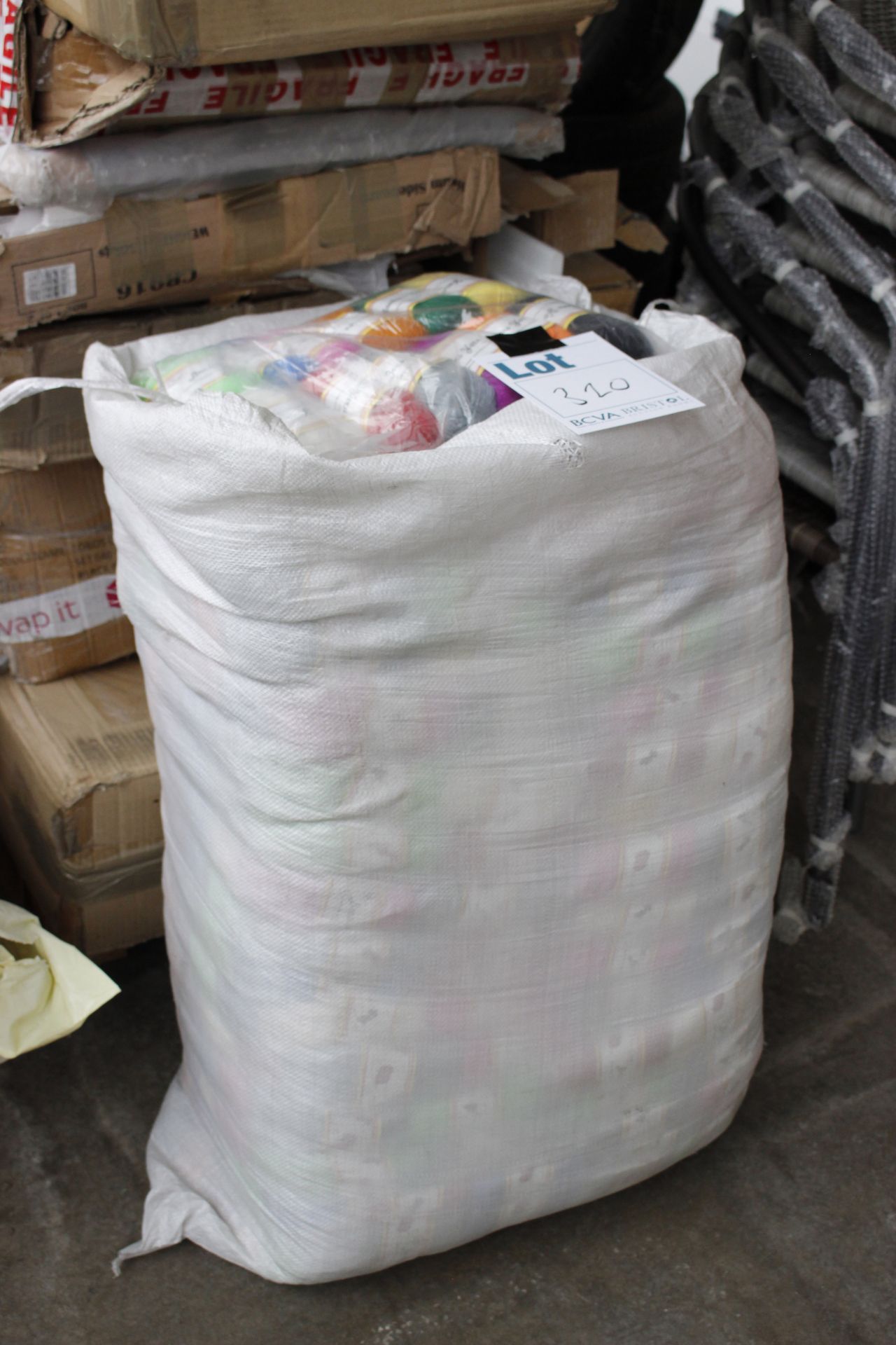 A sack of approximately thirty packets of Fuyit double knitting yarn 12x 50g yarn sets.