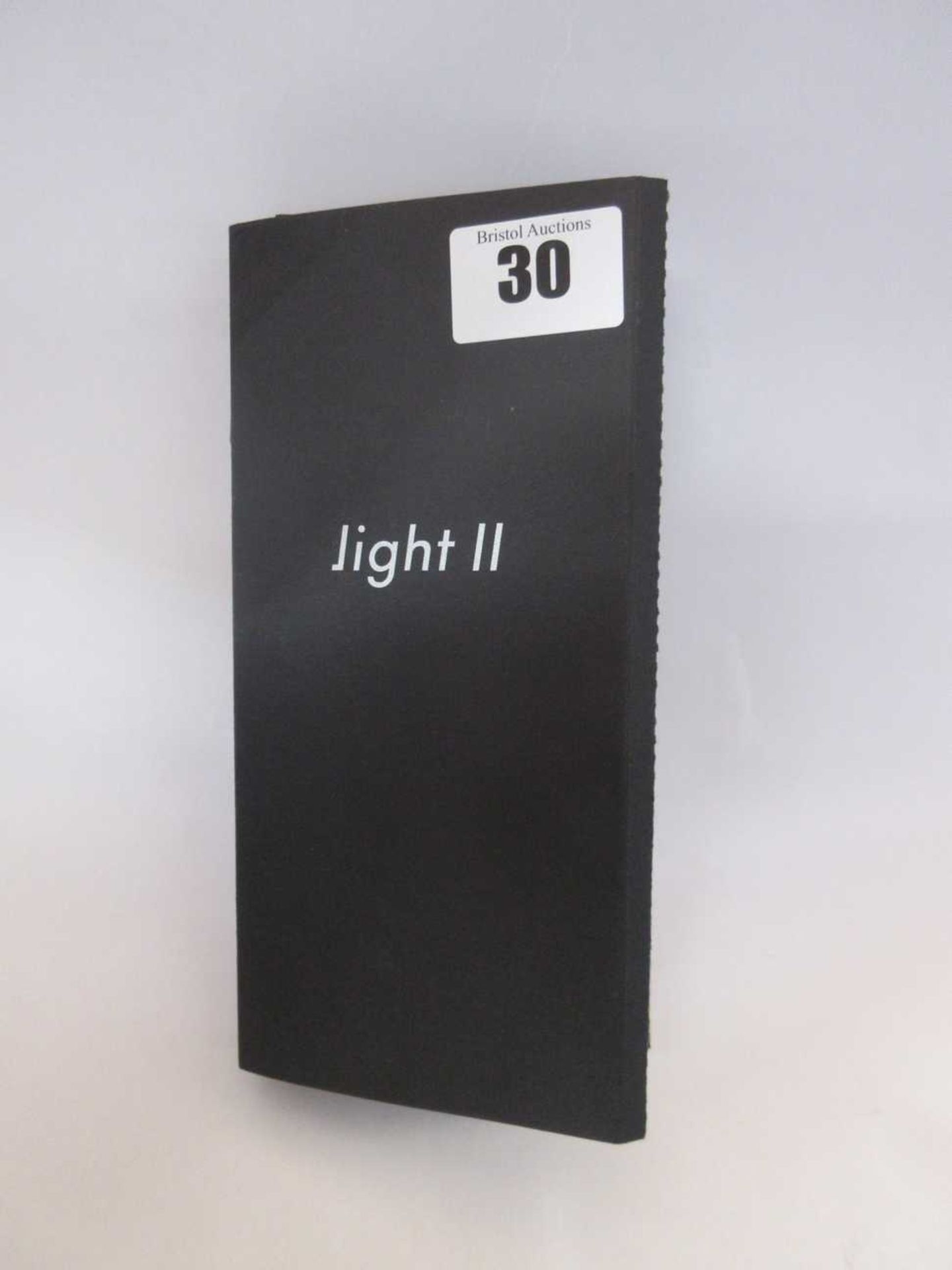 A boxed as new Light Phone 2 TLP202 in Black (IMEI: 352743100101665) (Box opened).