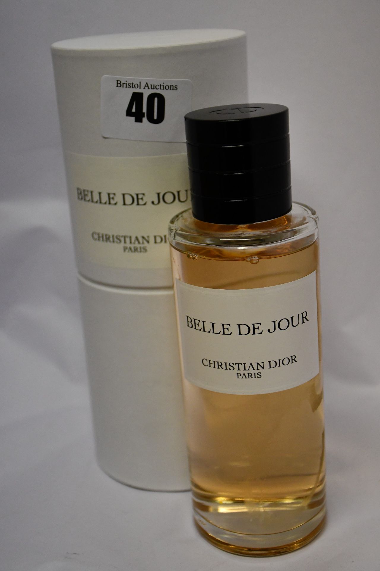 A Christian Dior Belle De Jour eau de parfum (250ml) (Very slightly used).