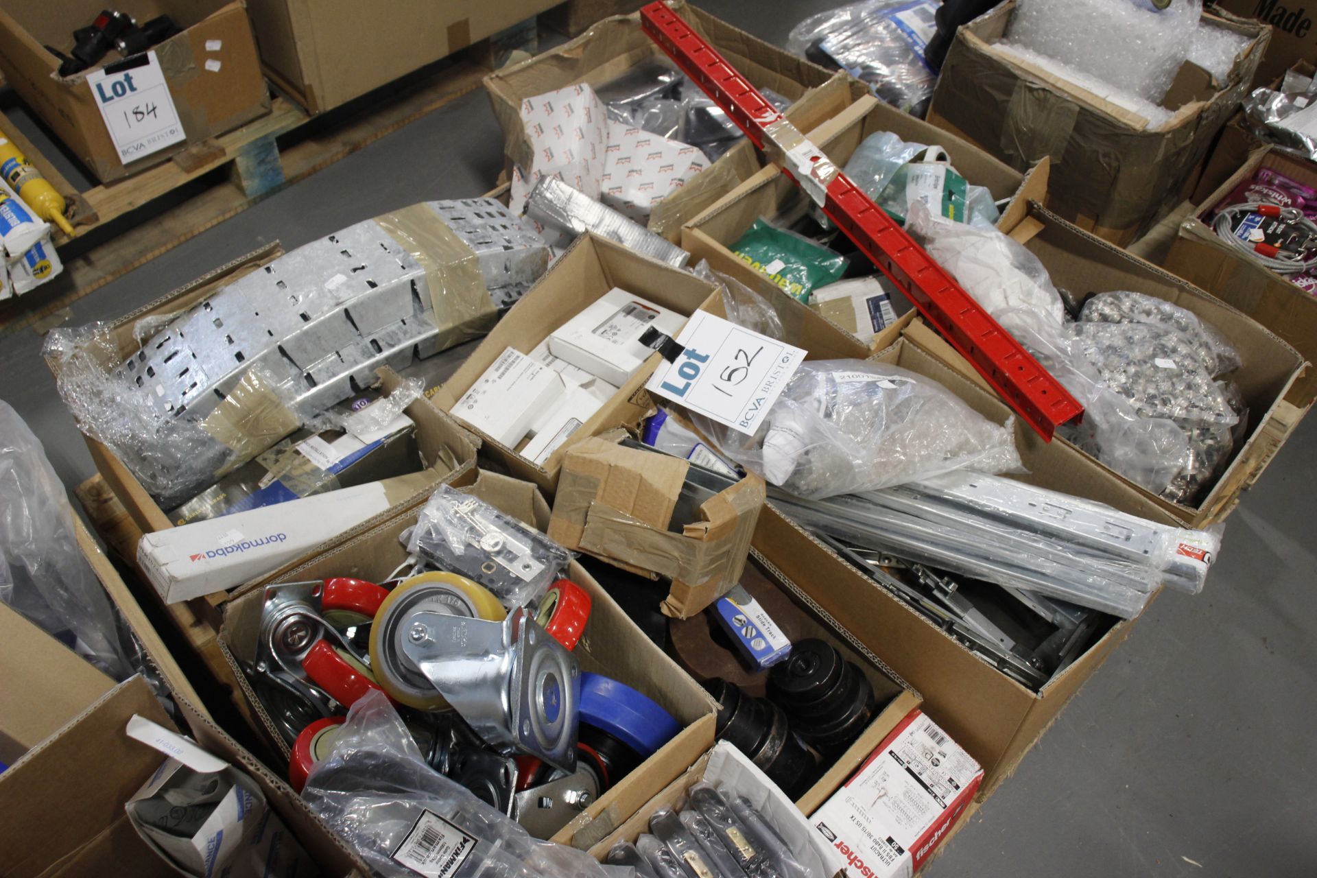 A pallet of various fixtures, fitting and engineering parts.