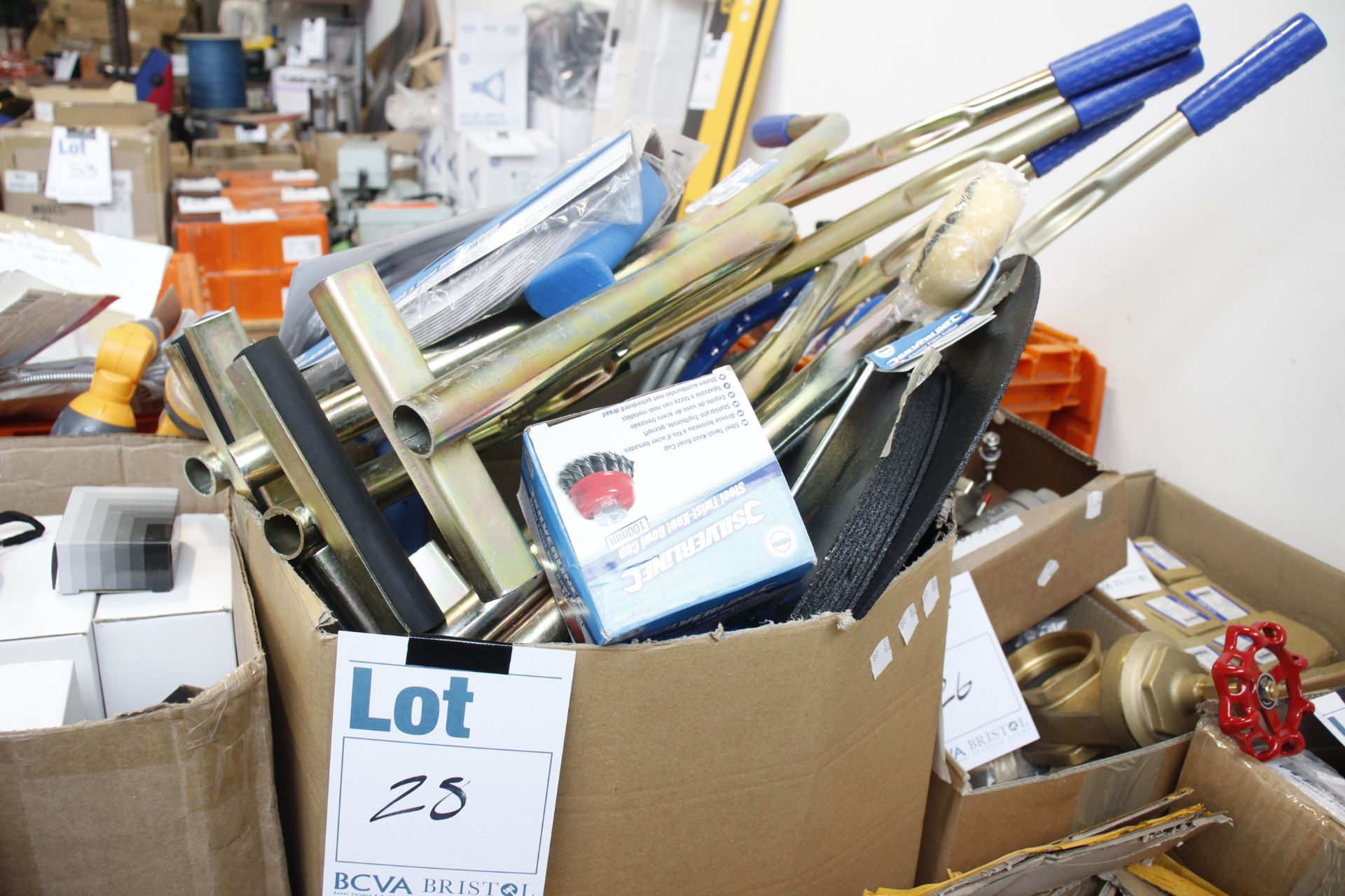 A box of various Silverline tools to include cutting disks and kerb tongs etc.