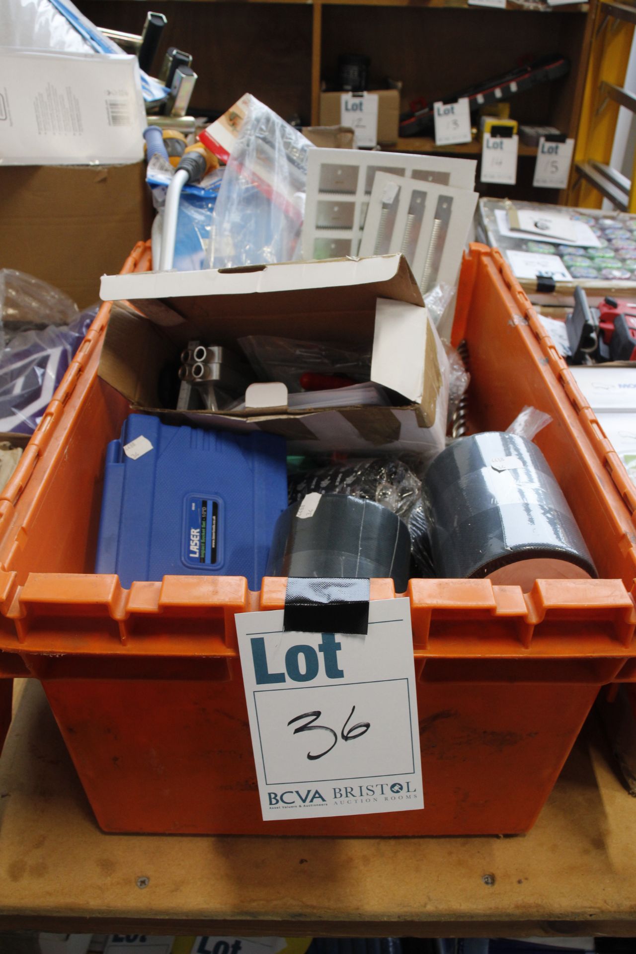 A box of assorted hand tools to include Laser impact socket set etc.