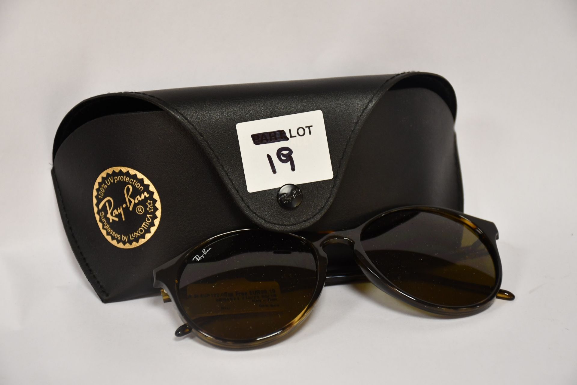 A pair of as new Ray Ban sunglasses.